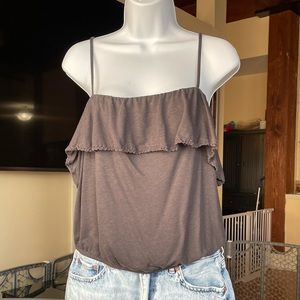 Three XL American Eagle crop tanks.